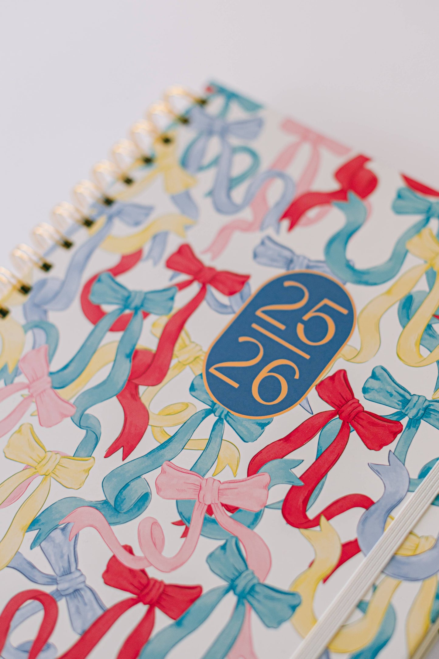 Good Juju Ink - 2026 Bows Pattern Toss 17-Month Large Spiral Planner